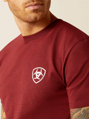 Ariat 10052510 Mens Eagle and Snake T-Shirt Burgundy front close up view. If you need any assistance with this item or the purchase of this item please call us at five six one seven four eight eight eight zero one Monday through Saturday 10:00a.m EST to 8:00 p.m EST