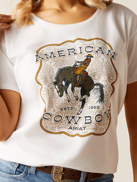 Ariat 10051439 Womens American Cowboy T-Shirt White close up view of front. If you need any assistance with this item or the purchase of this item please call us at five six one seven four eight eight eight zero one Monday through Saturday 10:00a.m EST to 8:00 p.m EST