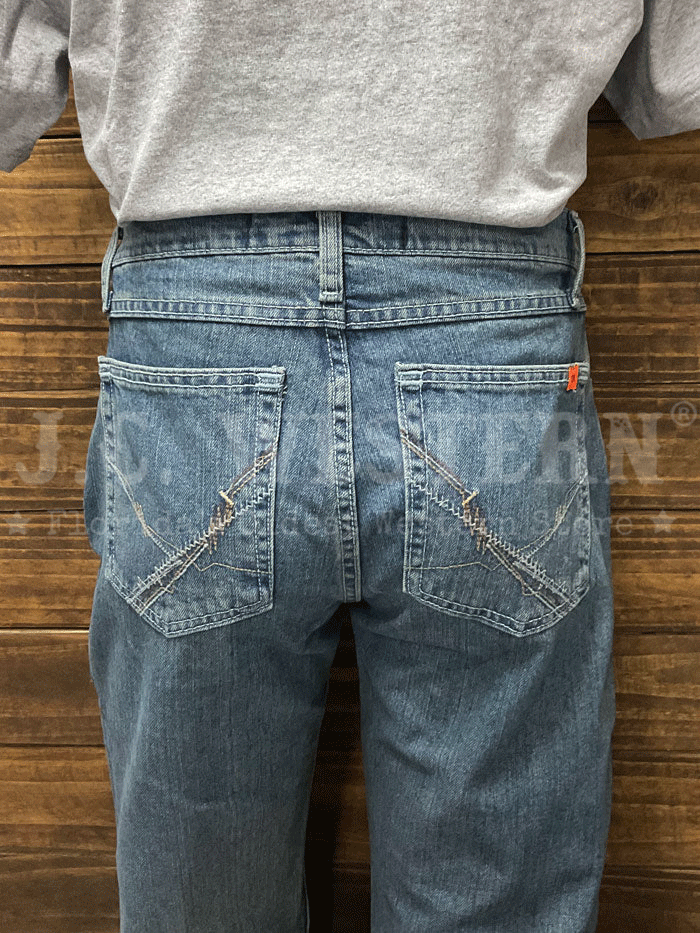 Wrangler FRCV42V Mens Flame Resistant Vintage Boot Jean Denim front view. If you need any assistance with this item or the purchase of this item please call us at five six one seven four eight eight eight zero one Monday through Saturday 10:00a.m EST to 8:00 p.m EST