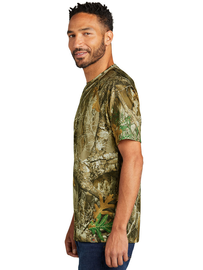 Russell Outdoors RU150 Mens Performance Short Sleeve Tee Realtree Edge front view. If you need any assistance with this item or the purchase of this item please call us at five six one seven four eight eight eight zero one Monday through Saturday 10:00a.m EST to 8:00 p.m EST