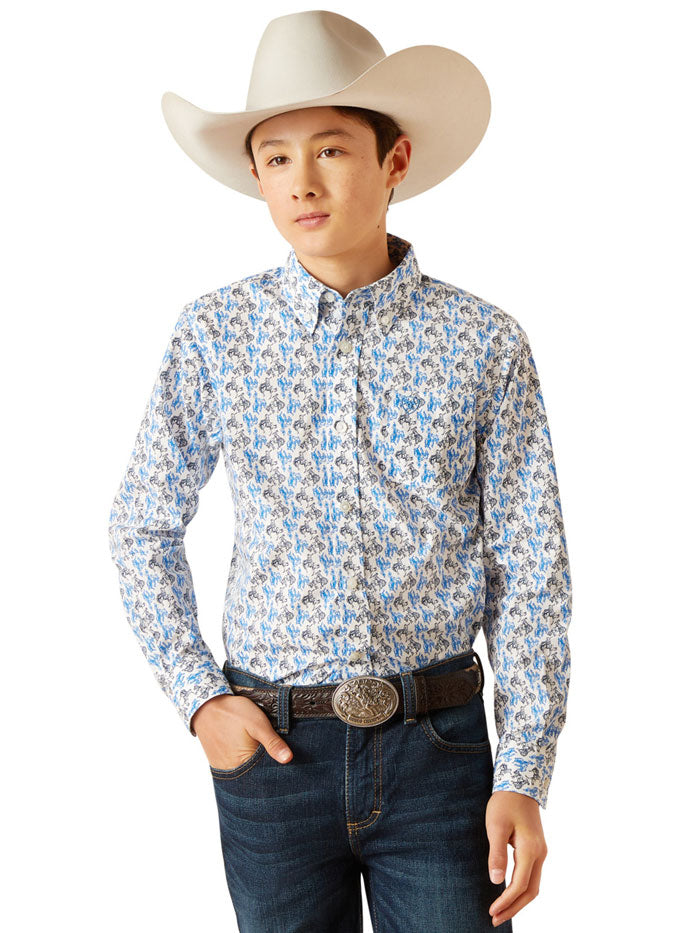 riat 10047296 Kids Peerce Classic Fit Shirt Blue front view. If you need any assistance with this item or the purchase of this item please call us at five six one seven four eight eight eight zero one Monday through Saturday 10:00a.m EST to 8:00 p.m EST