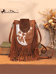 Trinity Ranch TR180-8360BR Womens Genuine Hair On Cowhide Tooled Fringe Crossbody Bag Brown alternate front view. If you need any assistance with this item or the purchase of this item please call us at five six one seven four eight eight eight zero one Monday through Saturday 10:00a.m EST to 8:00 p.m EST

