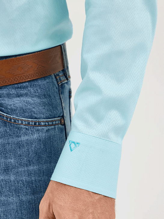 Wrangler 112365523 Mens Cody Johnson Button Down Shirt Aqua Chevron cuff close up. If you need any assistance with this item or the purchase of this item please call us at five six one seven four eight eight eight zero one Monday through Saturday 10:00a.m EST to 8:00 p.m EST