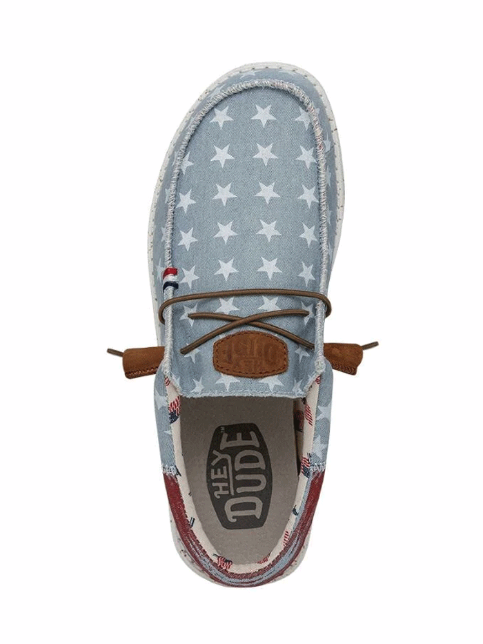 Hey Dude 40395-4NR Mens Wally Americana Shoe Denim Star front and side view. If you need any assistance with this item or the purchase of this item please call us at five six one seven four eight eight eight zero one Monday through Saturday 10:00a.m EST to 8:00 p.m EST
