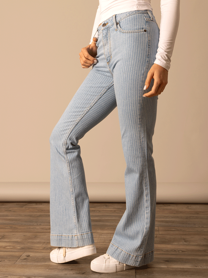 Person wearing light blue striped jeans and a white top on a wooden floor with a beige wall background front view. If you need any assistance with this item or the purchase of this item please call us at five six one seven four eight eight eight zero one Monday through Saturday 10:00a.m EST to 8:00 p.m EST
