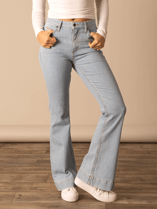 Person wearing light blue striped jeans and a white top on a wooden floor with a beige wall background front view. If you need any assistance with this item or the purchase of this item please call us at five six one seven four eight eight eight zero one Monday through Saturday 10:00a.m EST to 8:00 p.m EST