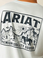 Ariat 10058882 Mens Echo Valley Pocket T-Shirt Quiet Ride Light Blue back graphic close up. If you need any assistance with this item or the purchase of this item please call us at five six one seven four eight eight eight zero one Monday through Saturday 10:00a.m EST to 8:00 p.m EST