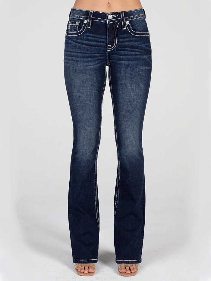 Miss Me M3080B53 Womens Mid-Rise Embroidered Wing Bootcut Jeans Dark Blue back pocket close up view. If you need any assistance with this item or the purchase of this item please call us at five six one seven four eight eight eight zero one Monday through Saturday 10:00a.m EST to 8:00 p.m EST
