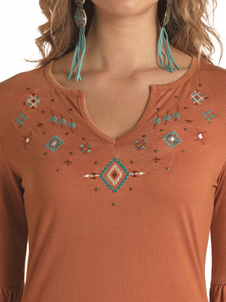 Panhandle LW52T02911 Ladies Embroidered Notched Neck Bell Sleeve Top Brass close up view of front. If you need any assistance with this item or the purchase of this item please call us at five six one seven four eight eight eight zero one Monday through Saturday 10:00a.m EST to 8:00 p.m EST
