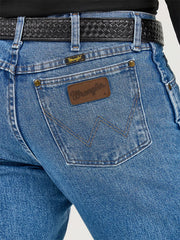 Wrangler 47MWZSW Mens Premium Performance Cowboy Cut Regular Fit Jean Stonewash back close up. If you need any assistance with this item or the purchase of this item please call us at five six one seven four eight eight eight zero one Monday through Saturday 10:00a.m EST to 8:00 p.m EST