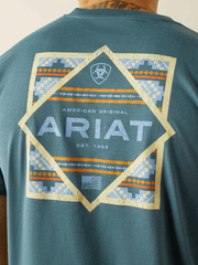 Ariat 10058897 Mens Puebla Serape T-Shirt Lagoon Green back graphic close up. If you need any assistance with this item or the purchase of this item please call us at five six one seven four eight eight eight zero one Monday through Saturday 10:00a.m EST to 8:00 p.m EST
