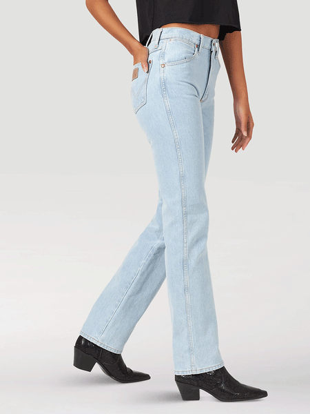 Wrangler 14MWZGH Womens Cowboy Cut Slim Fit Jean Bleach side view. If you need any assistance with this item or the purchase of this item please call us at five six one seven four eight eight eight zero one Monday through Saturday 10:00a.m EST to 8:00 p.m EST