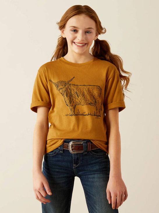 Ariat 10054022 Kids Highlander T-Shirt Harvest Gold front view. If you need any assistance with this item or the purchase of this item please call us at five six one seven four eight eight eight zero one Monday through Saturday 10:00a.m EST to 8:00 p.m EST