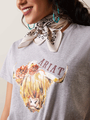 Ariat 10043417 Womens Real Highlander Rose Tee Heather Grey front close up of logo. If you need any assistance with this item or the purchase of this item please call us at five six one seven four eight eight eight zero one Monday through Saturday 10:00a.m EST to 8:00 p.m EST