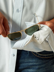 Ariat 10058814 Mens VentTEK Classic Fit Shirt Papyrus Light Blue lens cloth close up. If you need any assistance with this item or the purchase of this item please call us at five six one seven four eight eight eight zero one Monday through Saturday 10:00a.m EST to 8:00 p.m EST