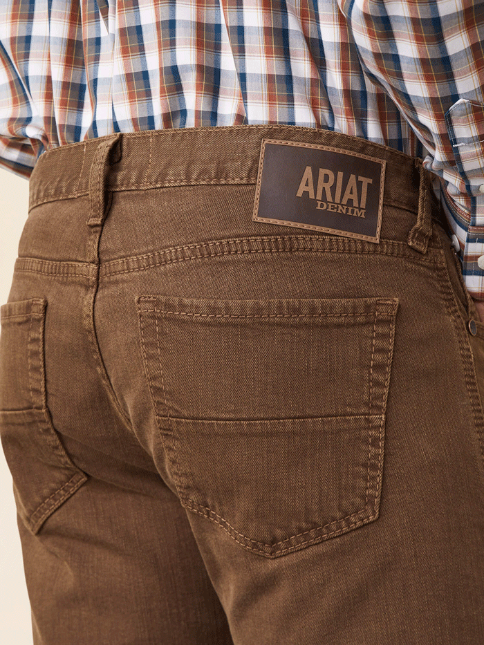 Ariat 10045230 Mens M7 Grizzly Straight Jean Peat Brown front view. If you need any assistance with this item or the purchase of this item please call us at five six one seven four eight eight eight zero one Monday through Saturday 10:00a.m EST to 8:00 p.m EST