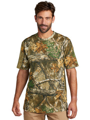 Russell Outdoors RU100 Mens Short Sleeve Tee Realtree Edge front view. If you need any assistance with this item or the purchase of this item please call us at five six one seven four eight eight eight zero one Monday through Saturday 10:00a.m EST to 8:00 p.m EST