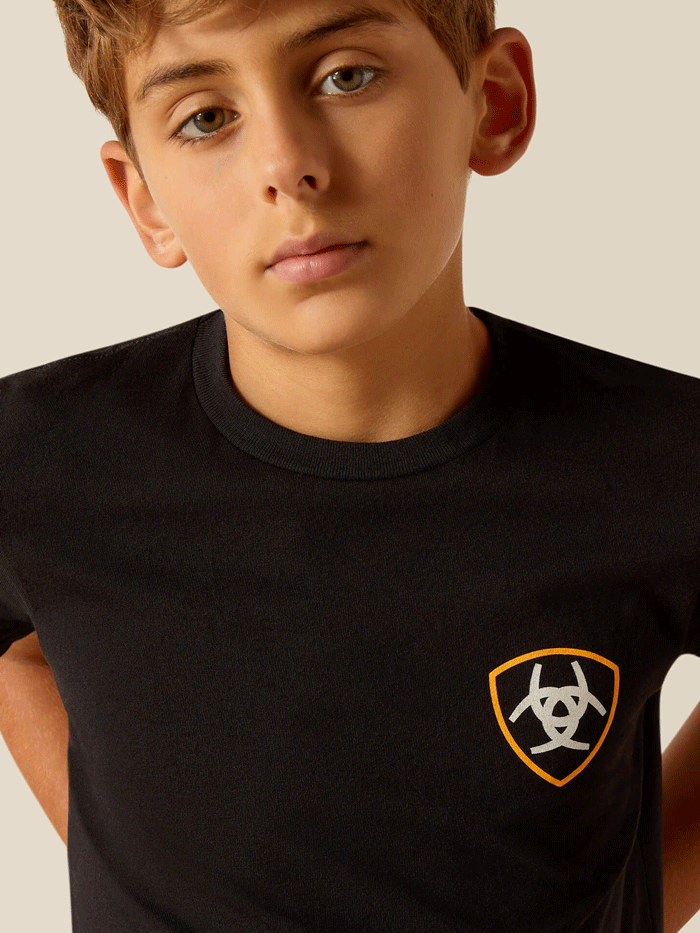 Ariat 10051431 Kids DMND Mountain T-Shirt Black back view. If you need any assistance with this item or the purchase of this item please call us at five six one seven four eight eight eight zero one Monday through Saturday 10:00a.m EST to 8:00 p.m EST