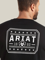 Ariat 10035630 Mens Ariat 93 Liberty T-Shirt Black back logo close up. If you need any assistance with this item or the purchase of this item please call us at five six one seven four eight eight eight zero one Monday through Saturday 10:00a.m EST to 8:00 p.m EST