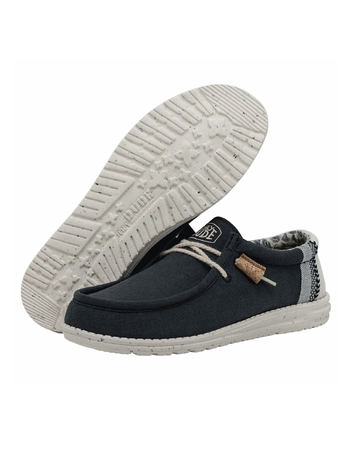 Hey Dude 40015-410 Mens Wally Break Stitch Shoe Navy front and side view. If you need any assistance with this item or the purchase of this item please call us at five six one seven four eight eight eight zero one Monday through Saturday 10:00a.m EST to 8:00 p.m EST
