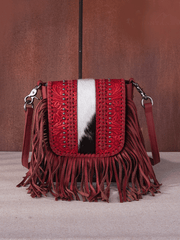 Montana West RLC-L168RD Womens Genuine Leather Tooled Fringe Crossbody Bag Red front view. If you need any assistance with this item or the purchase of this item please call us at five six one seven four eight eight eight zero one Monday through Saturday 10:00a.m EST to 8:00 p.m EST