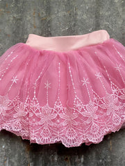 Shea Baby CS02 Kids Chiffon Skirt Pink close up. If you need any assistance with this item or the purchase of this item please call us at five six one seven four eight eight eight zero one Monday through Saturday 10:00a.m EST to 8:00 p.m EST