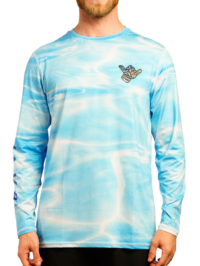 Shaka Kai DaveL TIGHT LINES Mens Long Sleeve Performance Shirt Light Blue back view. If you need any assistance with this item or the purchase of this item please call us at five six one seven four eight eight eight zero one Monday through Saturday 10:00a.m EST to 8:00 p.m EST