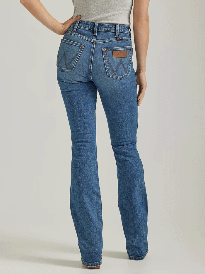 Wrangler 112338900 Womens Retro Premium High Rise Slim Boot Jean Abigail front view. If you need any assistance with this item or the purchase of this item please call us at five six one seven four eight eight eight zero one Monday through Saturday 10:00a.m EST to 8:00 p.m EST