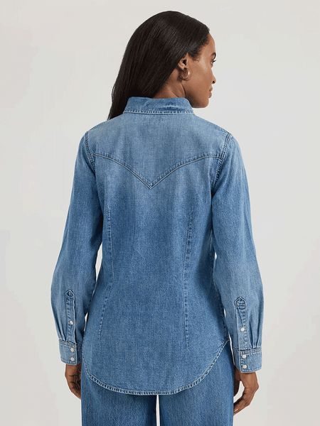 Wrangler 112360739 Womens Classic Denim Slim Western Snap Shirt Mid Wash back view. If you need any assistance with this item or the purchase of this item please call us at five six one seven four eight eight eight zero one Monday through Saturday 10:00a.m EST to 8:00 p.m EST