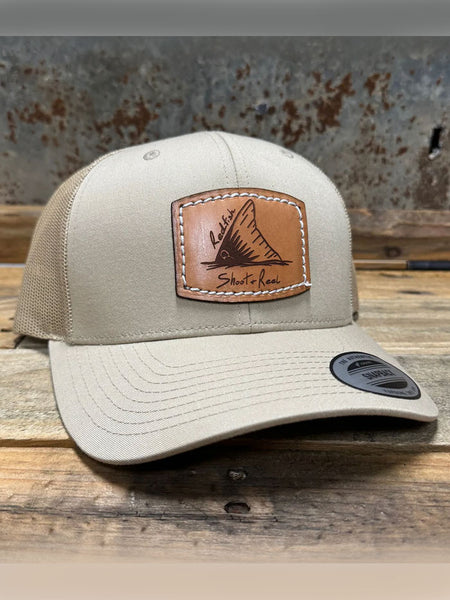 Shoot & Reel SR7 Redfish Tail Patch Curved Bill Cap Khaki side / front view. If you need any assistance with this item or the purchase of this item please call us at five six one seven four eight eight eight zero one Monday through Saturday 10:00a.m EST to 8:00 p.m EST