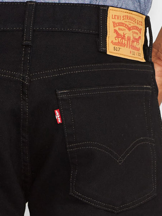 Levi's 005170260 Mens 517 Mid Rise Slim Fit Bootcut Jeans Black back pocket close up. If you need any assistance with this item or the purchase of this item please call us at five six one seven four eight eight eight zero one Monday through Saturday 10:00a.m EST to 8:00 p.m EST