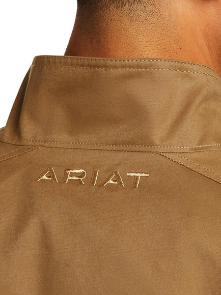 Ariat 10037497 Mens Grizzly Canvas Lightweight Jacket Cub ARIAT logo on back close up. If you need any assistance with this item or the purchase of this item please call us at five six one seven four eight eight eight zero one Monday through Saturday 10:00a.m EST to 8:00 p.m EST