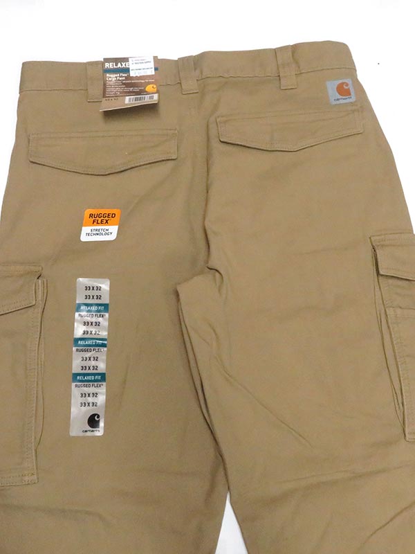 Carhartt 103574-253 Mens Rugged Flex Rigby Cargo Pant Dark Khaki front view. If you need any assistance with this item or the purchase of this item please call us at five six one seven four eight eight eight zero one Monday through Saturday 10:00a.m EST to 8:00 p.m EST