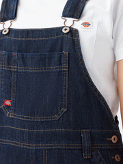 Dickies FB206DIB Womens Relaxed Fit Bib Overalls Dark Indigo front close up. If you need any assistance with this item or the purchase of this item please call us at five six one seven four eight eight eight zero one Monday through Saturday 10:00a.m EST to 8:00 p.m EST