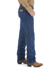 Wrangler 13MWZPW Cowboy Cut Regular Fit Jeans Prewashed Indigo side view. If you need any assistance with this item or the purchase of this item please call us at five six one seven four eight eight eight zero one Monday through Saturday 10:00a.m EST to 8:00 p.m EST