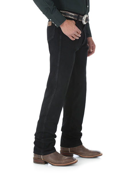 Wrangler 13MWZWK Cowboy Cut Regular Fit Jeans Shadow Black side view. If you need any assistance with this item or the purchase of this item please call us at five six one seven four eight eight eight zero one Monday through Saturday 10:00a.m EST to 8:00 p.m EST