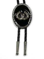 Fashionwest 1708S Crystal Gold Horseshoe Oval Western Bolo Tie close up. If you need any assistance with this item or the purchase of this item please call us at five six one seven four eight eight eight zero one Monday through Saturday 10:00a.m EST to 8:00 p.m EST