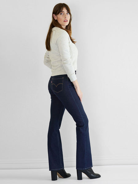 Levis 187590050 Womens 725 High Rise Bootcut Jeans Cast Shadows side view. If you need any assistance with this item or the purchase of this item please call us at five six one seven four eight eight eight zero one Monday through Saturday 10:00a.m EST to 8:00 p.m EST