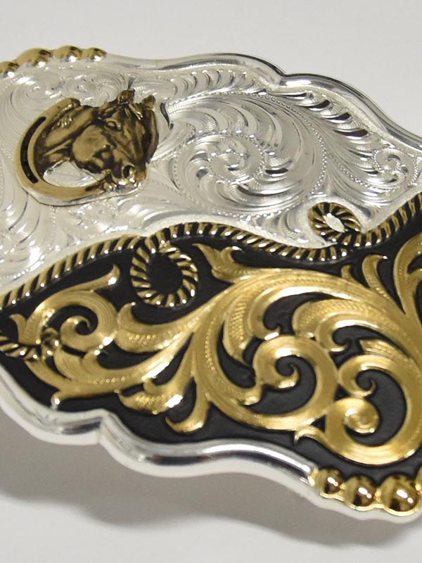Montana Silversmiths 35410YG 2-Tone Horseshead Rope Filigree Buckle front view. If you need any assistance with this item or the purchase of this item please call us at five six one seven four eight eight eight zero one Monday through Saturday 10:00a.m EST to 8:00 p.m EST
