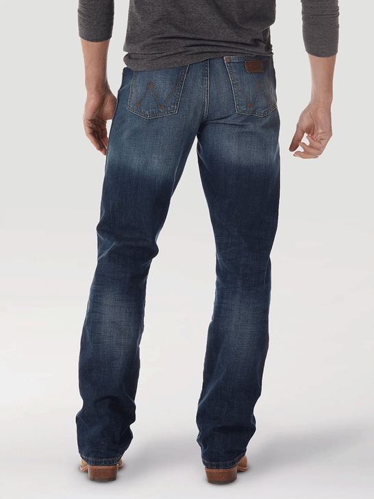 Wrangler WRT20JH Mens Retro Relaxed Fit Bootcut JH Wash back view. If you need any assistance with this item or the purchase of this item please call us at five six one seven four eight eight eight zero one Monday through Saturday 10:00a.m EST to 8:00 p.m EST