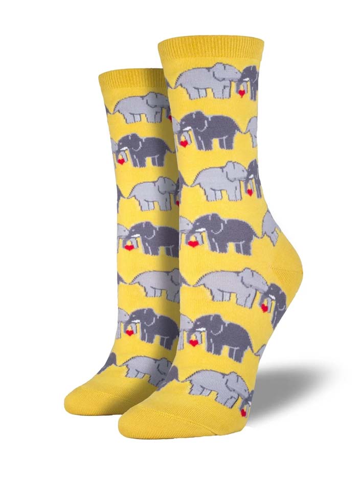 Socksmith SSW1302-BUT Womens Elephant Love Crew Socks buttercup front and side view. If you need any assistance with this item or the purchase of this item please call us at five six one seven four eight eight eight zero one Monday through Saturday 10:00a.m EST to 8:00 p.m EST