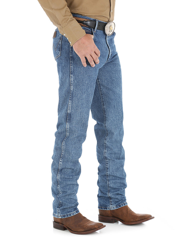 Wrangler 47MWZDS Mens Premium Cowboy Cut Regular Fit Jeans Dark Stone front view. If you need any assistance with this item or the purchase of this item please call us at five six one seven four eight eight eight zero one Monday through Saturday 10:00a.m EST to 8:00 p.m EST