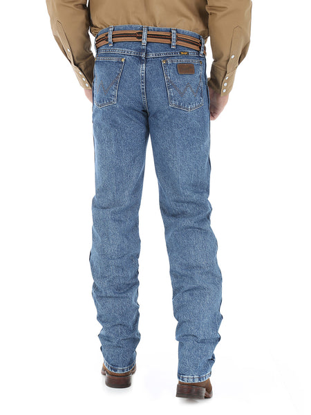 Wrangler 47MWZDS Mens Premium Cowboy Cut Regular Fit Jeans Dark Stone back view. If you need any assistance with this item or the purchase of this item please call us at five six one seven four eight eight eight zero one Monday through Saturday 10:00a.m EST to 8:00 p.m EST