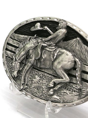 Spec Cast 5785 Saddlebronc Rider Scene Solid Pewter Belt Buckle front close up view. If you need any assistance with this item or the purchase of this item please call us at five six one seven four eight eight eight zero one Monday through Saturday 10:00a.m EST to 8:00 p.m EST