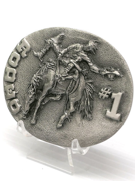 Spec Cast 5812 Rodeo #1 Solid Pewter Belt Buckle front close up view. If you need any assistance with this item or the purchase of this item please call us at five six one seven four eight eight eight zero one Monday through Saturday 10:00a.m EST to 8:00 p.m EST