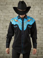 Rockmount 6726 Mens 2 Tone Space Cowboy Embroidered Western Shirt Black Turquoise front view on model. If you need any assistance with this item or the purchase of this item please call us at five six one seven four eight eight eight zero one Monday through Saturday 10:00a.m EST to 8:00 p.m EST