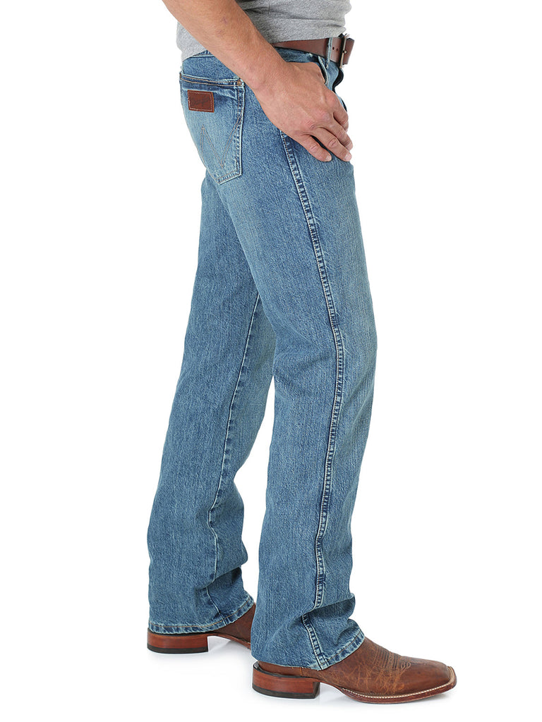Wrangler 77MWZWO Mens Retro Jeans Slim Boot Worn front view. If you need any assistance with this item or the purchase of this item please call us at five six one seven four eight eight eight zero one Monday through Saturday 10:00a.m EST to 8:00 p.m EST