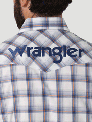 Wrangler 112317123 Mens Logo Long Sleeve Western Snap Plaid Shirt Clouds back logo close up. If you need any assistance with this item or the purchase of this item please call us at five six one seven four eight eight eight zero one Monday through Saturday 10:00a.m EST to 8:00 p.m EST