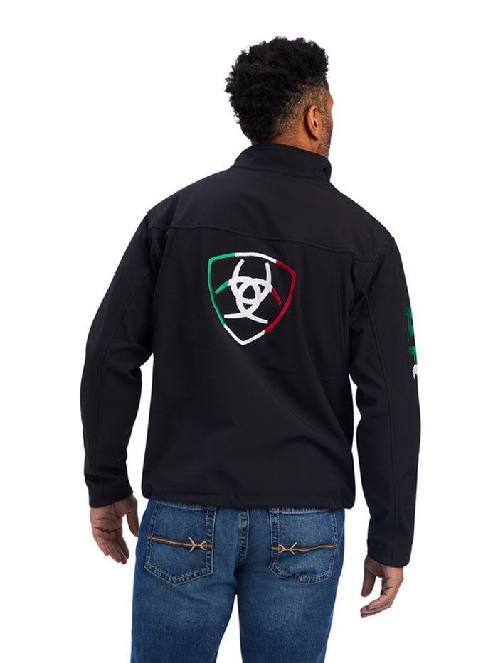 Ariat 10043055 Mens Team Mexico Logo Softshell Jacket Black front view. If you need any assistance with this item or the purchase of this item please call us at five six one seven four eight eight eight zero one Monday through Saturday 10:00a.m EST to 8:00 p.m EST