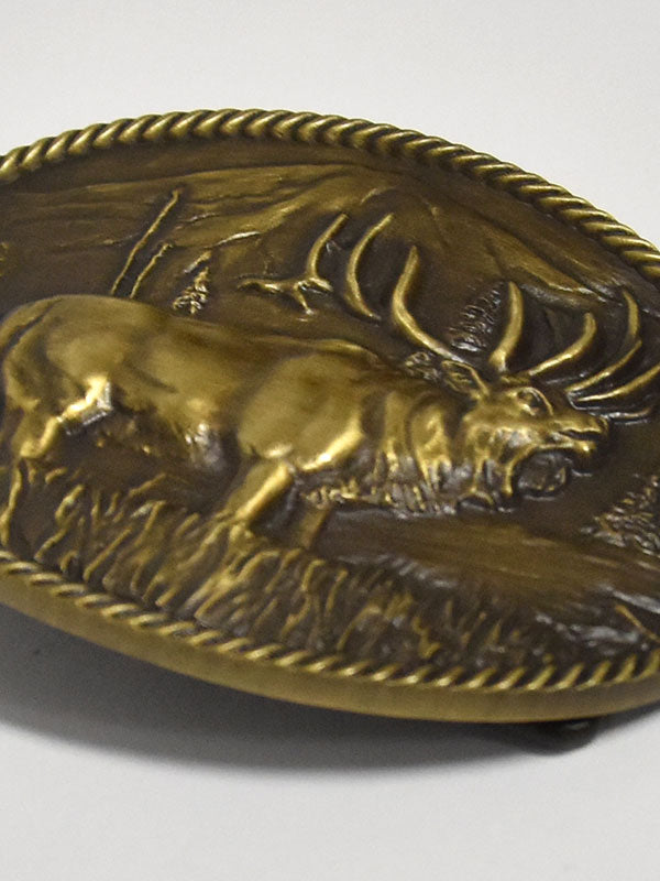 Montana Silversmiths A506C Sculpted Wild Elk Heritage Attitude Buckle Bronze front view. If you need any assistance with this item or the purchase of this item please call us at five six one seven four eight eight eight zero one Monday through Saturday 10:00a.m EST to 8:00 p.m EST